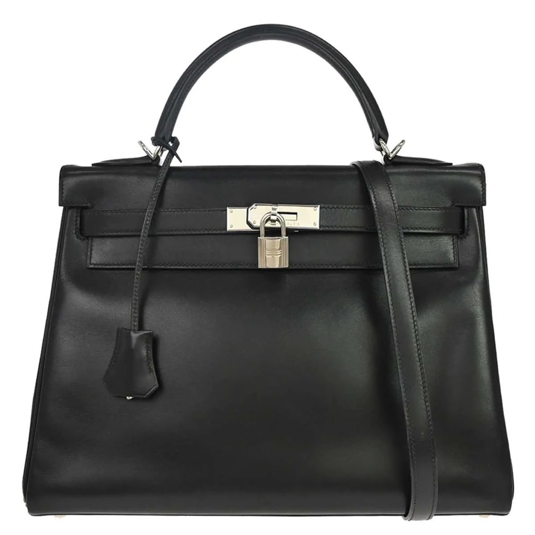 Hermes Kelly Black Box Calf Leather Handbag with Strap and Padlock: Hermes Kelly Black Box Calf Leather Handbag with Strap and Padlock This Hermes Kelly Handbag features black Box Calf leather complemented by palladium hardware. Designed for women, it offers a classic