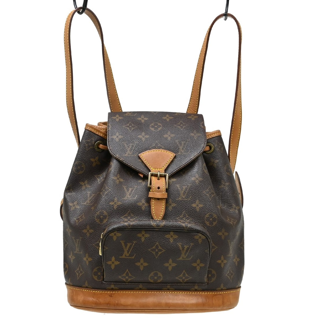 Louis Vuitton Montsouris MM Monogram Canvas Backpack M51136: Louis Vuitton Montsouris MM Monogram Canvas Backpack M51136 Vintage Louis Vuitton Montsouris MM backpack in brown Monogram canvas with leather trim. This medium backpack features a flap buckle and dra