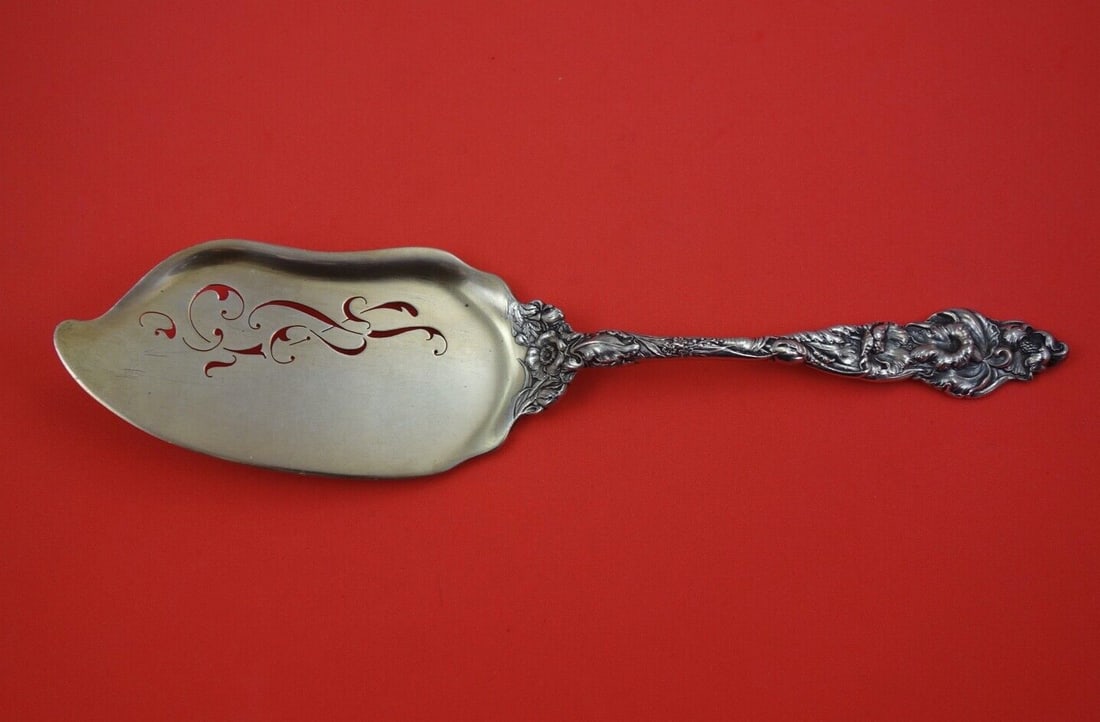 Reed and Barton Les Six Fleurs Sterling Silver Fish Server 11 5/8" Gilded Pierced Design: Reed and Barton Les Six Fleurs Sterling Silver Fish Server 11 5/8" Gilded Pierced Design Discover the elegance of the Les Six Fleurs fish server by Reed & Barton, a stunning piece crafted from sterlin