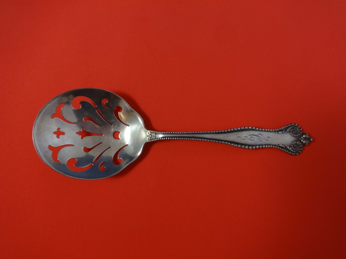 Mount Vernon Sterling Silver Twentieth Century Slotted Pea Spoon 8 7/8": Mount Vernon Sterling Silver Twentieth Century Slotted Pea Spoon 8 7/8" This exquisite slotted pea spoon, crafted from high-quality sterling silver, showcases the elegant Twentieth Century pattern by 