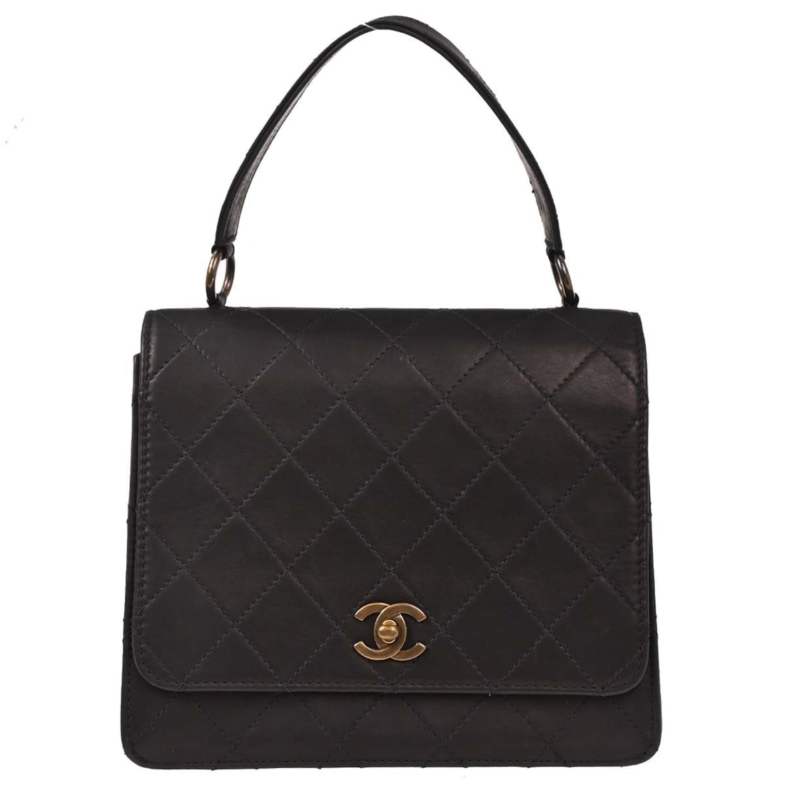 Small Top Handle Satchel in Black Lambskin by Chanel: Small Top Handle Satchel in Black Lambskin by Chanel Black lambskin Chanel handbag with a top handle and turn-lock closure. This small satchel-style bag features a black leather lining, one exterior p