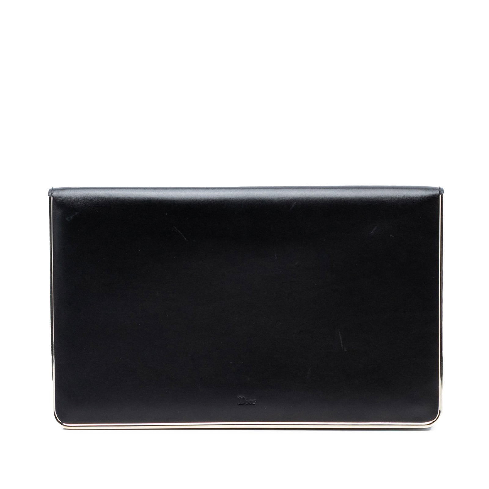 Dior black leather flap clutch with metal trim: Dior black leather flap clutch with metal trim Black leather clutch with metal trim and a front flap secured by a magnetic snap closure. Made in Italy, this piece shows visible wear and surface scratc