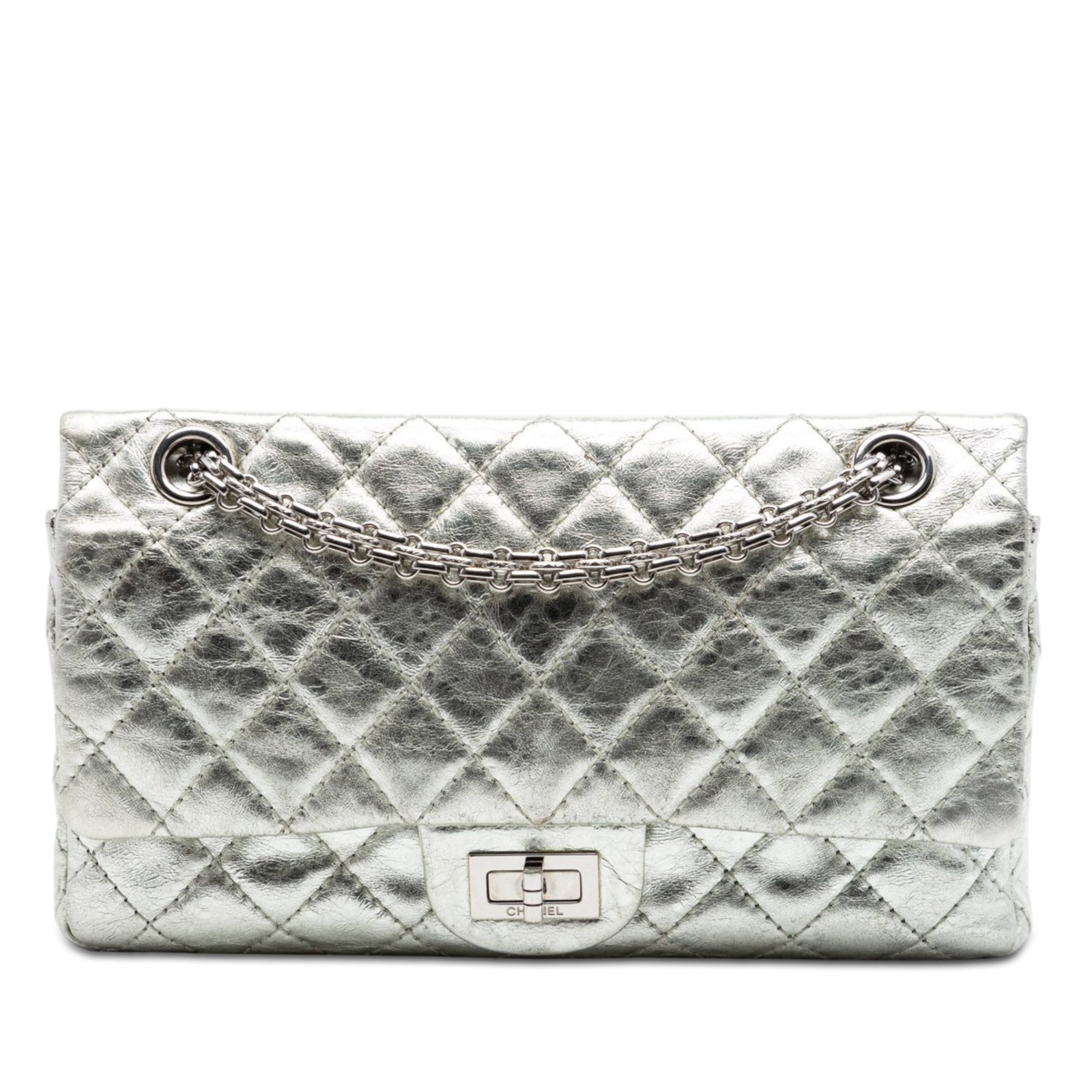 Chanel Reissue 2.55 Metallic Aged Calfskin Shoulder Bag 225: Chanel Reissue 2.55 Metallic Aged Calfskin Shoulder Bag 225 This Chanel Metallic Aged Calfskin Reissue 2.55 Double Flap 225 shoulder bag features a quilted calfskin leather body in a silver finish. It