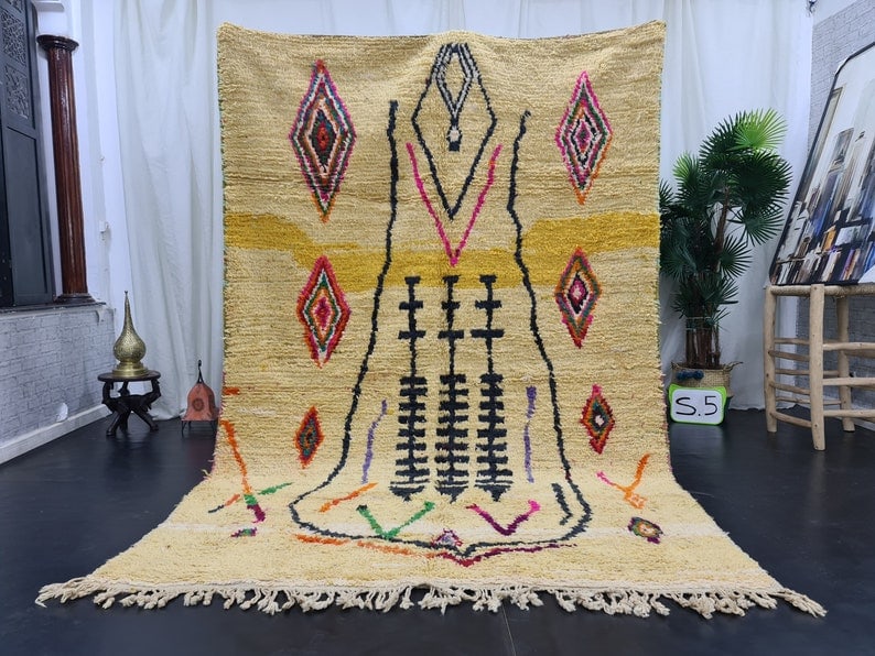 Authentic Moroccan Berber Handwoven Wool Rug 8 x 5 Feet: Authentic Moroccan Berber Handwoven Wool Rug 8 x 5 Feet Experience the warmth and vibrancy of this authentic handwoven Moroccan Berber wool rug. Crafted by skilled local Berber women in the Middle Atl