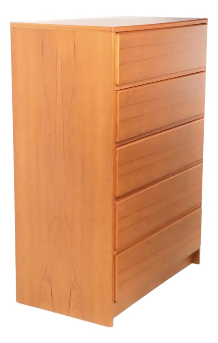 Uldum Danish teak veneer five drawer chest: Uldum Danish teak veneer five drawer chest This mid-century Danish modern chest of drawers by Uldum dates to the 1970s and is crafted with a teak veneer. It features five spacious drawers equipped wit