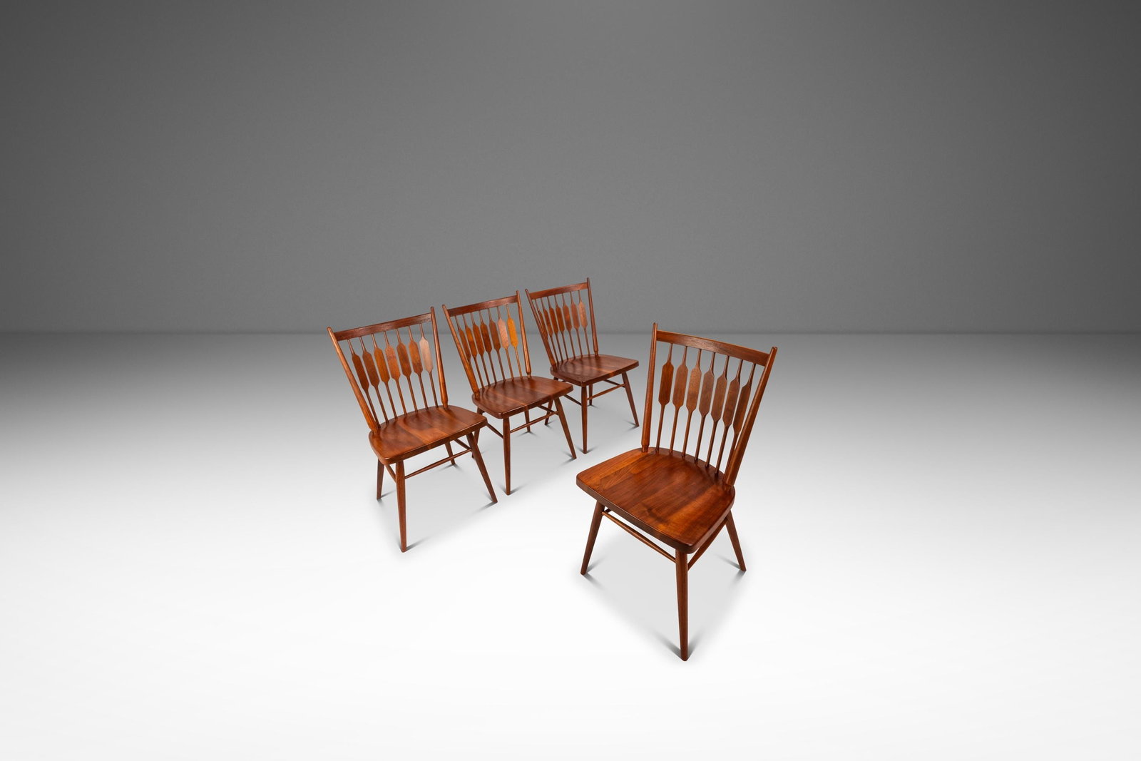 Set of 4 Walnut Windsor Centennial Dining Chairs by Kipp Stewart for Drexel 1960s: Set of 4 Walnut Windsor Centennial Dining Chairs by Kipp Stewart for Drexel 1960s This set includes four Mid-Century Modern Windsor "Centennial" dining side chairs crafted from solid walnut, designed 