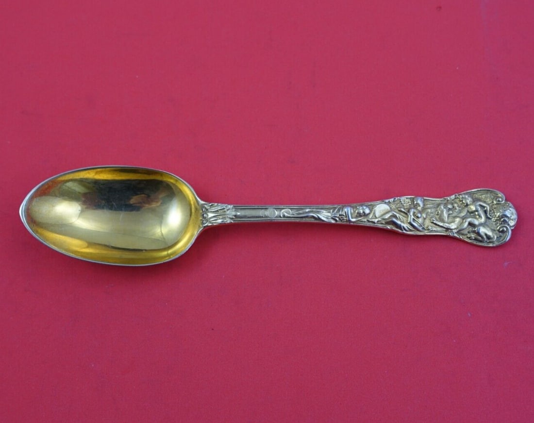 Bacchanalian Vermeil English Sterling Silver Dessert Spoon 7 1/8: Bacchanalian Vermeil English Sterling Silver Dessert Spoon 7 1/8 Indulge in the elegance of this Bacchanalian dessert spoon, crafted from sterling silver and beautifully vermeil (fully gold washed). T