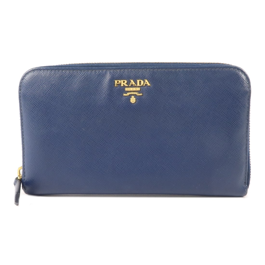 Prada Saffiano Navy Long Zippy Wallet GHW 1M0506: Prada Saffiano Navy Long Zippy Wallet GHW 1M0506 This PRADA round zippy long wallet is crafted from high-quality calfskin leather in a sophisticated navy color. Designed for both men and women, it fea