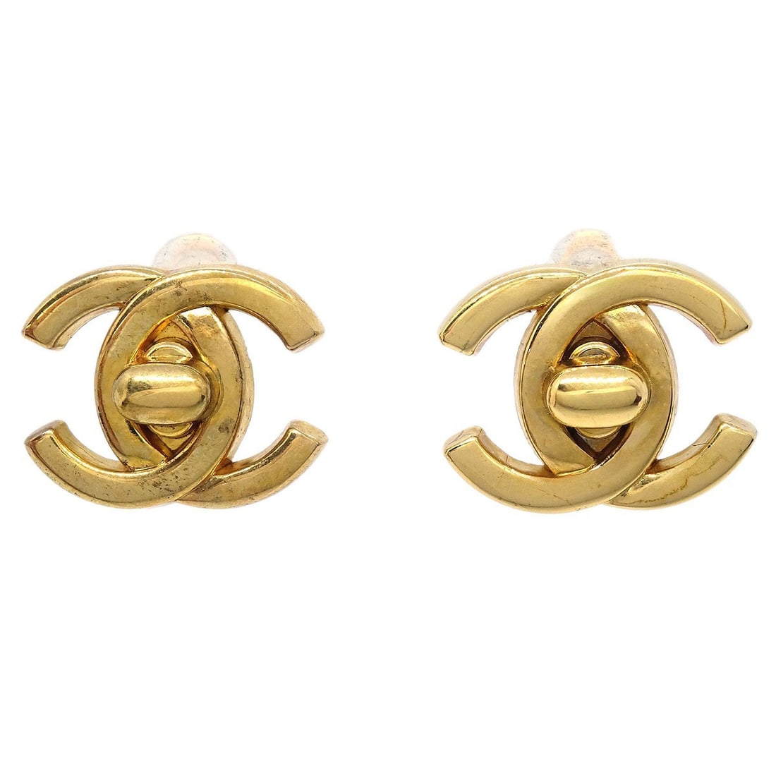 Chanel 96P CC Turnlock Gold Tone Clip On Earrings: Chanel 96P CC Turnlock Gold Tone Clip On Earrings Small Chanel clip-on earrings featuring the CC logo turnlock motif in a gold-tone finish. Marked 96P and made in France, this pair is presented in ver