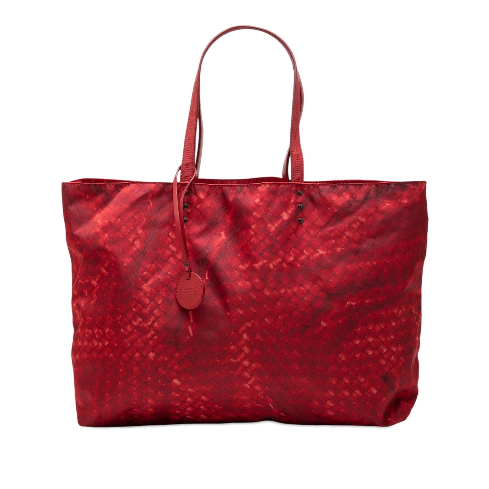Bottega Veneta Red Nylon Tote Intrecciolusion: Bottega Veneta Red Nylon Tote Intrecciolusion This Bottega Veneta Nylon Intrecciolusion Tote features a printed nylon body complemented by flat leather shoulder straps and an open top design. The bag 
