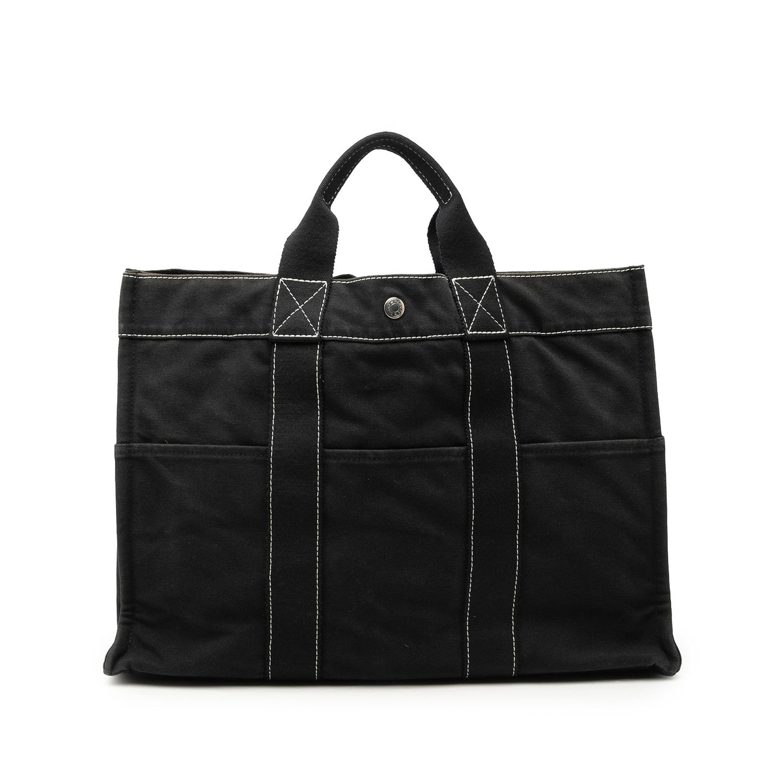 Hermes Fourre Tout MM Canvas Tote Bag Black: Hermes Fourre Tout MM Canvas Tote Bag Black Hermes Fourre Tout MM tote in black canvas with front and back exterior slip pockets, flat handles, an open top with snap closure, and an interior zip compa