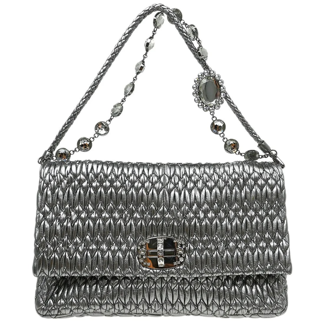 Miu Miu Silver Leather Nappa Matelasse Bag: Miu Miu Silver Leather Nappa Matelasse Bag This Miu Miu Nappa Matelasse bag is crafted from silver leather and features the brand's signature quilted design. Designed for unisex use, it offers a styli