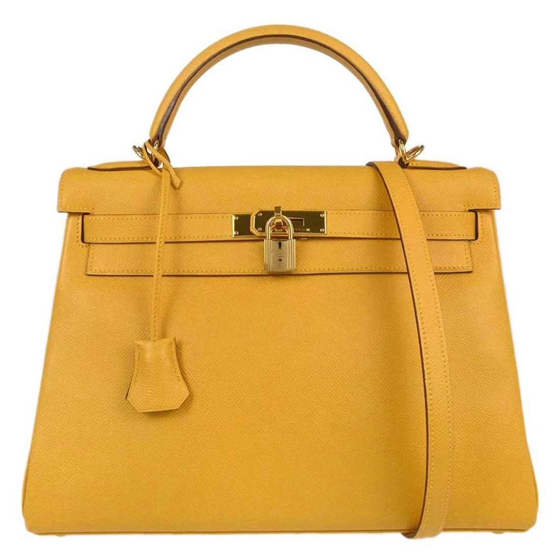 Hermes Kelly 32 Retourne Jaune Courchevel Leather Top Handle Bag: Hermes Kelly 32 Retourne Jaune Courchevel Leather Top Handle Bag Hermes Kelly 32 Retourne 2-way handbag in Jaune Courchevel leather. This women's satchel features a turn-lock flap closure, top handle,