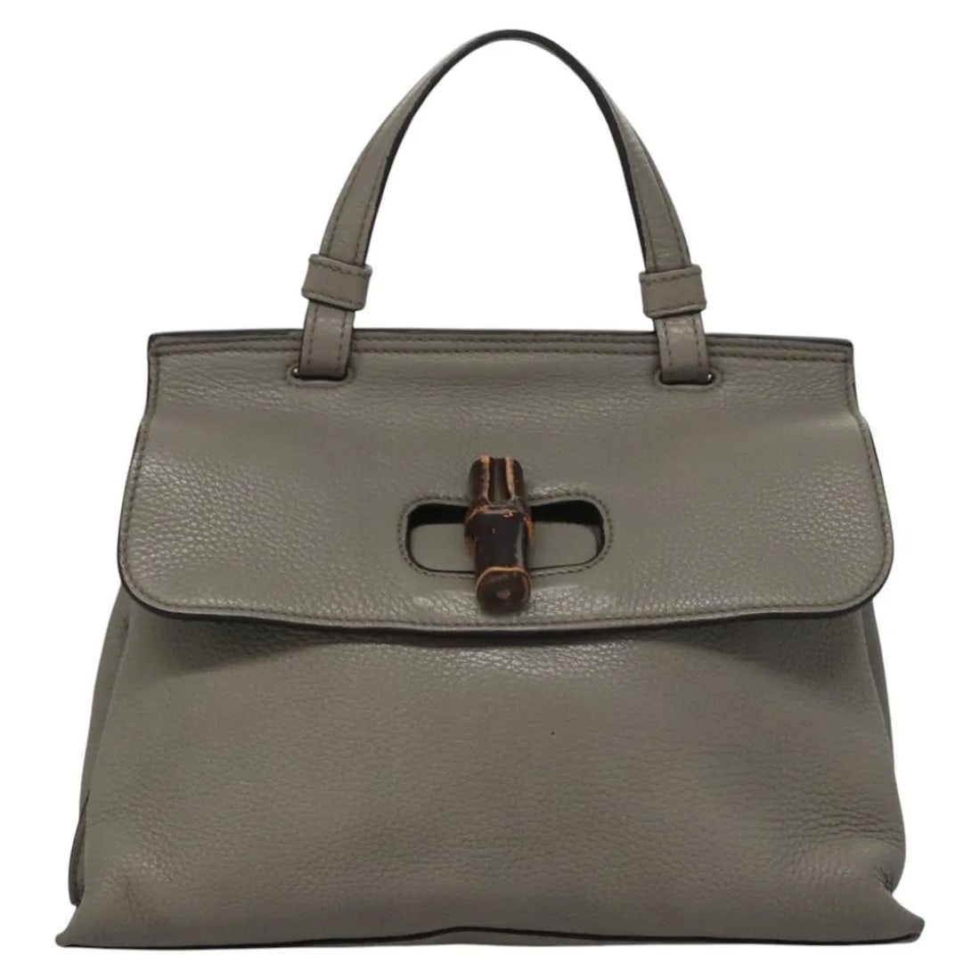 Gucci Bamboo Daily gray leather handbag with top handle: Gucci Bamboo Daily gray leather handbag with top handle The Gucci Bamboo Daily Top Handle Bag features a gray leather exterior with a bamboo top handle. Designed for women, this Italian-made bag is cr