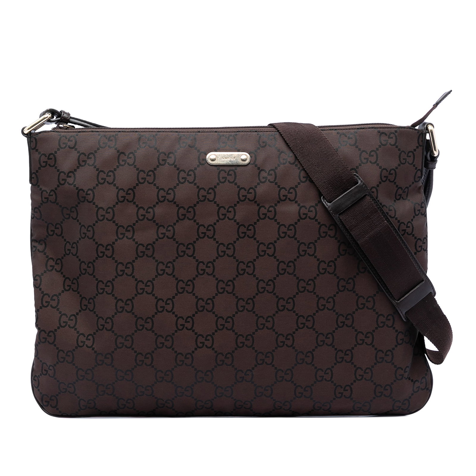 Gucci GG Nylon Brown Crossbody Bag: Gucci GG Nylon Brown Crossbody Bag This Gucci GG Nylon Crossbody bag features a durable nylon body in brown, complemented by a flat strap for comfortable wear. The bag is designed with a top zip closu