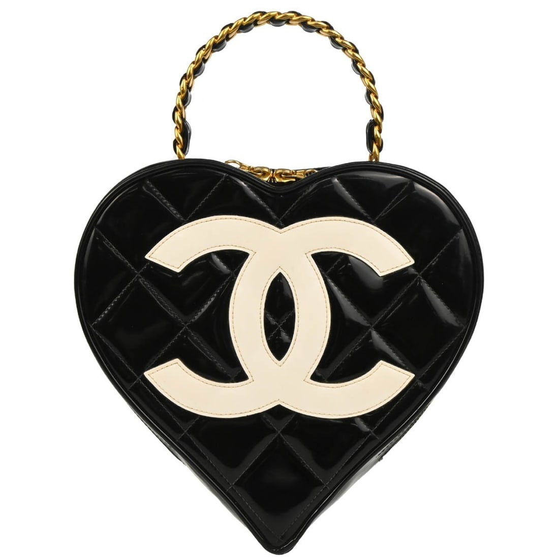 Chanel Quilted Heart Vanity Cosmetic Bag in Black Patent Leather: Chanel Quilted Heart Vanity Cosmetic Bag in Black Patent Leather Heart-shaped Chanel vanity handbag in black patent leather with a quilted matelasse design and white logo accent on the front. This top