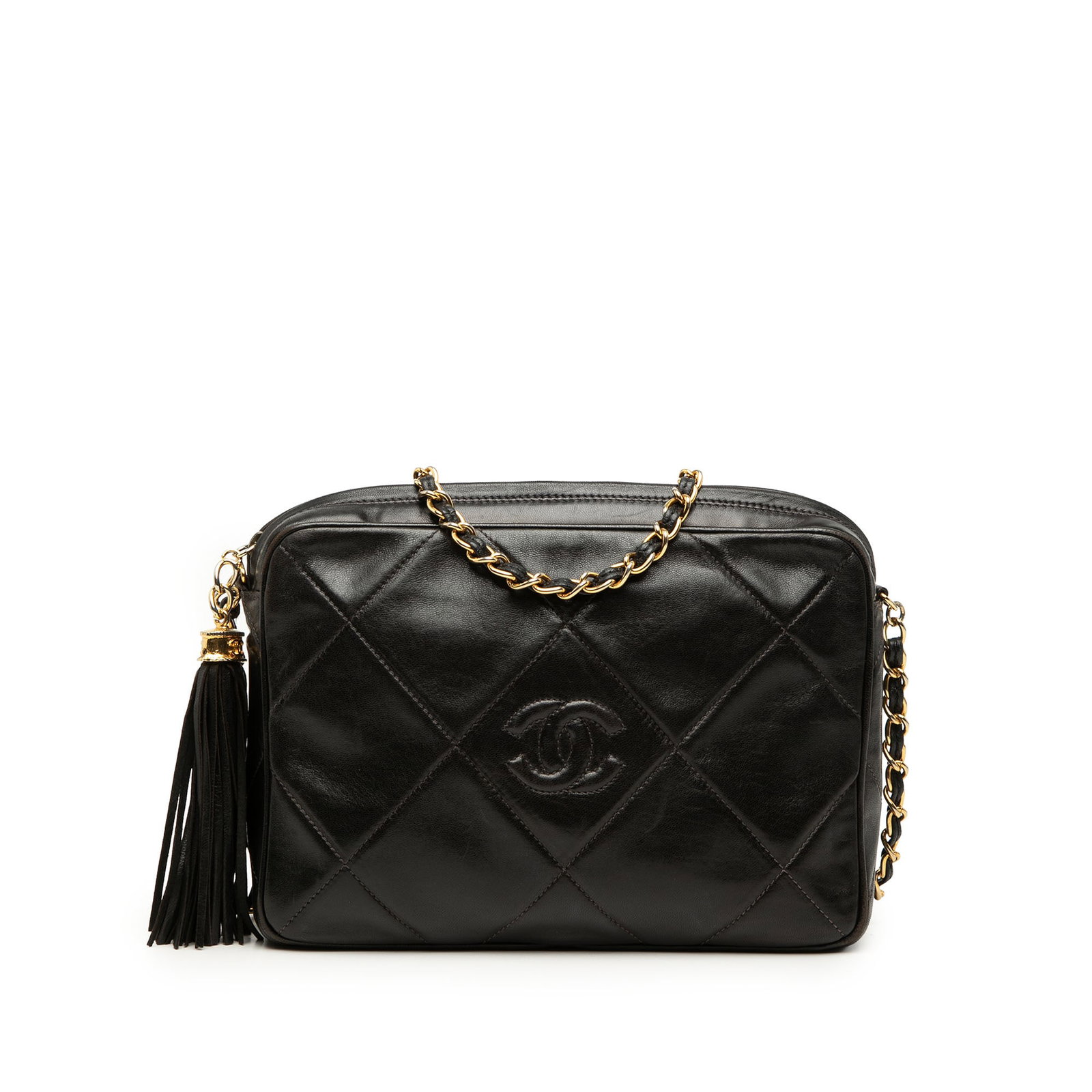 Chanel black lambskin camera crossbody bag with tassel: Chanel black lambskin camera crossbody bag with tassel Chanel CC Diamond Quilted Lambskin Tassel Camera Bag in black quilted lambskin leather. This crossbody style features tassel detailing, a leather