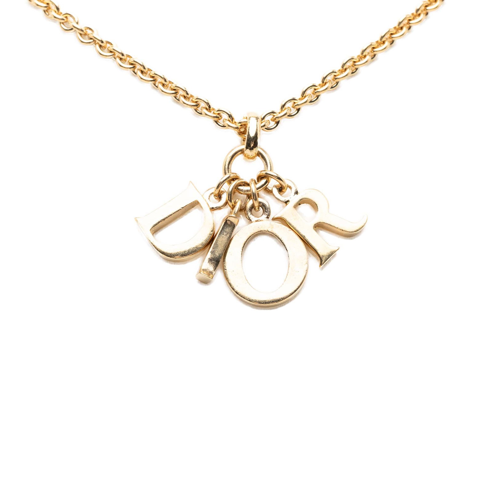 Dior Logo Pendant Necklace Gold Plated Metal: Dior Logo Pendant Necklace Gold Plated Metal Dior logo pendant necklace in gold-tone metal with a coordinating chain and lobster clasp closure. This costume jewelry piece is made in Germany. Condition
