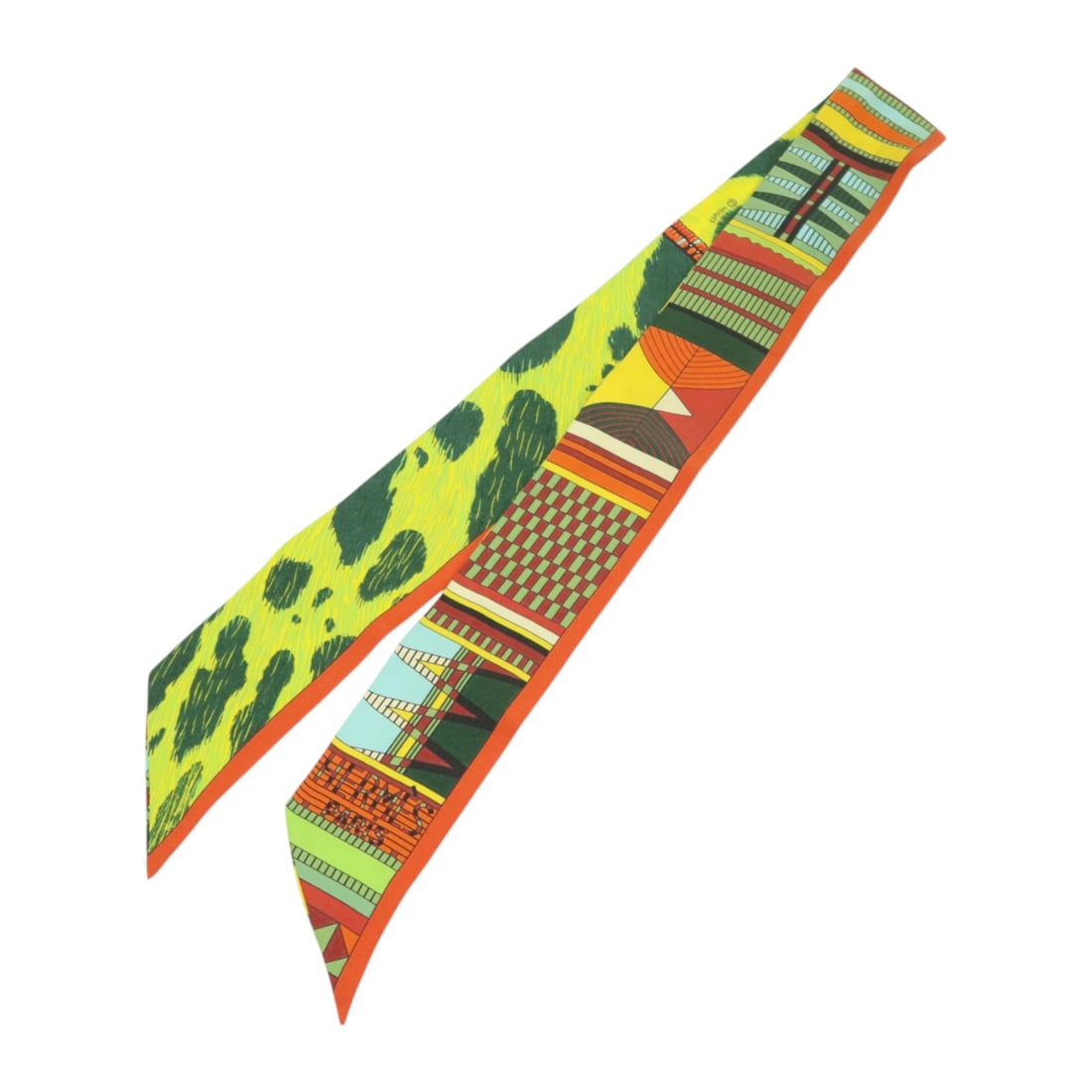 Hermes Silk Twilly Womens Scarf in Green Yellow and Multicolor: Hermes Silk Twilly Womens Scarf in Green Yellow and Multicolor This Hermes Twilly scarf is crafted from silk and features a vibrant green, yellow, and multicolor design. Made in France, it is tailored