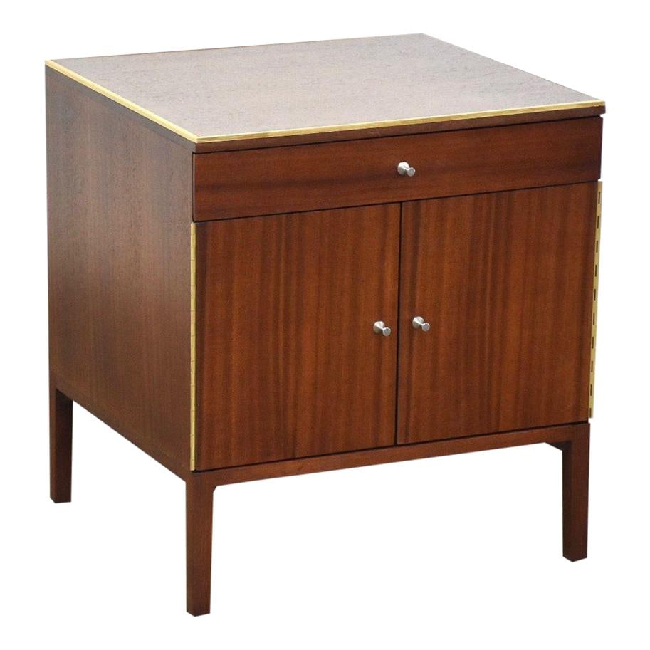 Paul McCobb Mid Century Modern Mahogany Brass Nightstand: Paul McCobb Mid Century Modern Mahogany Brass Nightstand This mid-century modern nightstand, designed by Paul McCobb for Directional's Calvin Collection, showcases a sophisticated blend of mahogany an