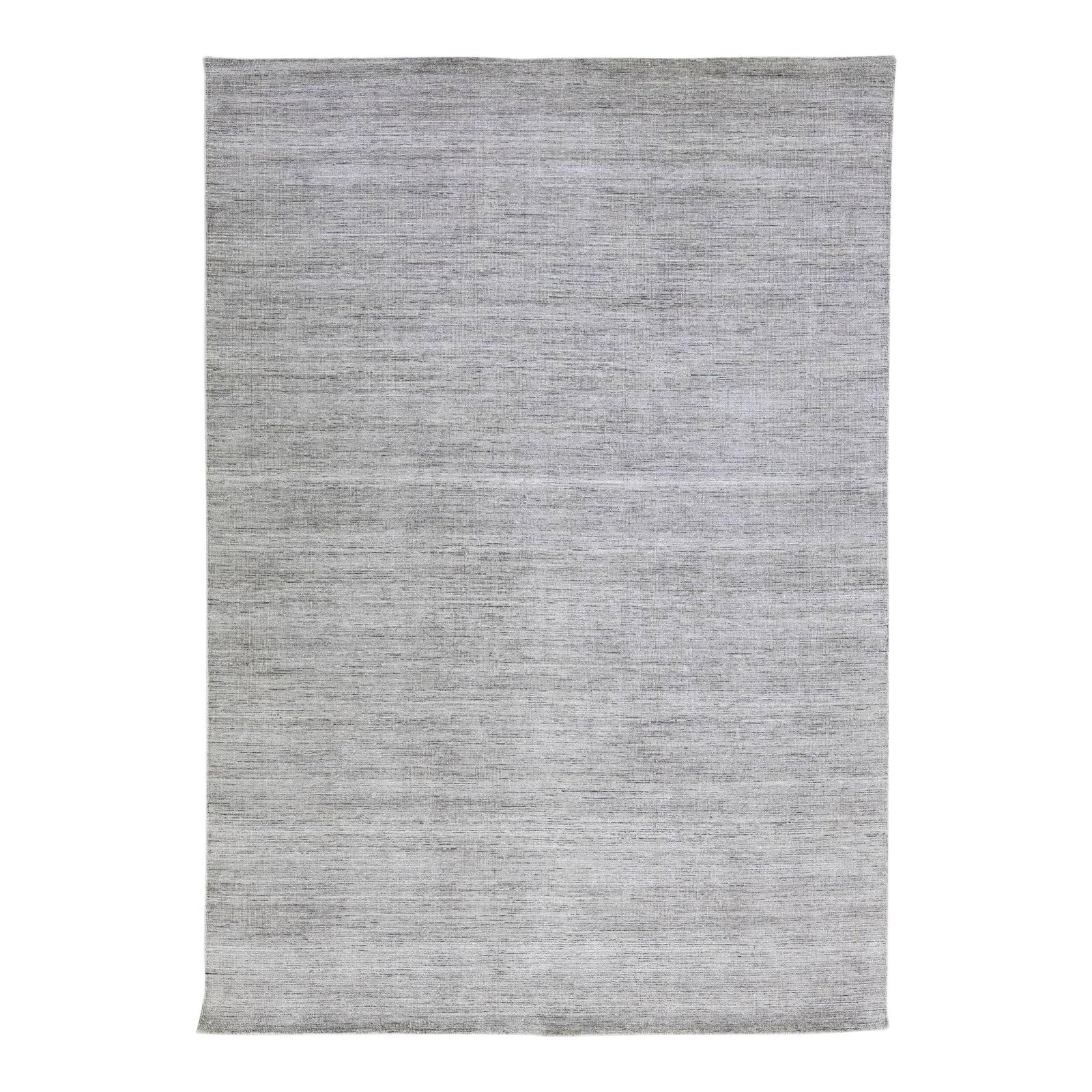 Groove Handmade Bamboo Silk Gray Rug 9' x 12': Groove Handmade Bamboo Silk Gray Rug 9' x 12' Enhance your living space with this exquisite handmade groove rug from the collection. Crafted from a luxurious blend of bamboo and silk, this rug