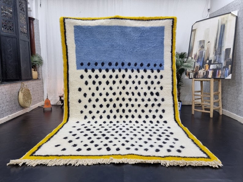 Authentic Handmade Moroccan Berber Wool Area Rug 9.84 x 6.56 Feet: Authentic Handmade Moroccan Berber Wool Area Rug 9.84 x 6.56 Feet Enhance your living space with this stunning authentic soft dotted handmade Moroccan Berber wool area rug. Crafted with care by skille