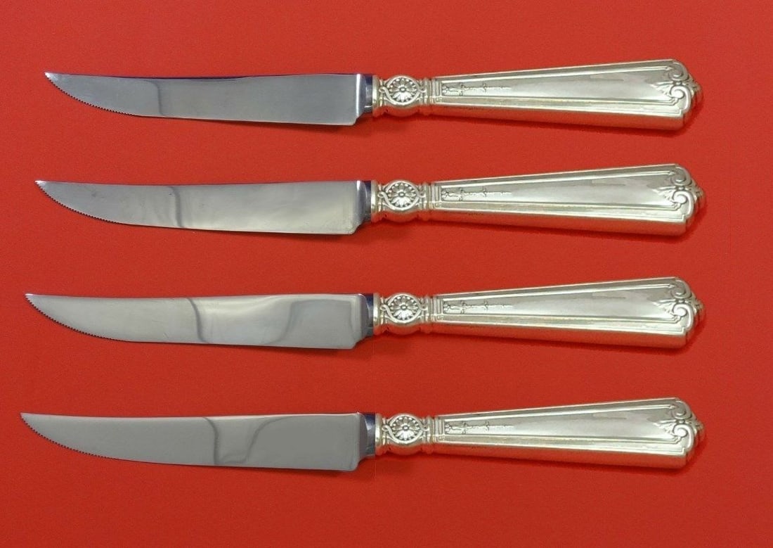 Durgin Victorian Sterling Silver Steak Knife Set 4pc Custom 8.5": Durgin Victorian Sterling Silver Steak Knife Set 4pc Custom 8.5" Enhance your dining experience with this exquisite 4-piece steak knife set from Durgin, featuring the elegant Victorian pattern. Crafte