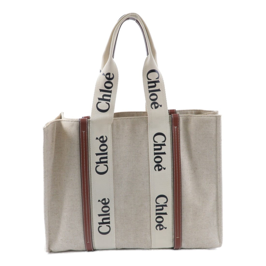 Chloe Beige Canvas Large Women Tote Bag: Chloe Beige Canvas Large Women Tote Bag This Chloe Woody Large Tote Bag features a beige canvas exterior, offering a stylish and practical accessory for everyday use. Designed for women, the tote prov