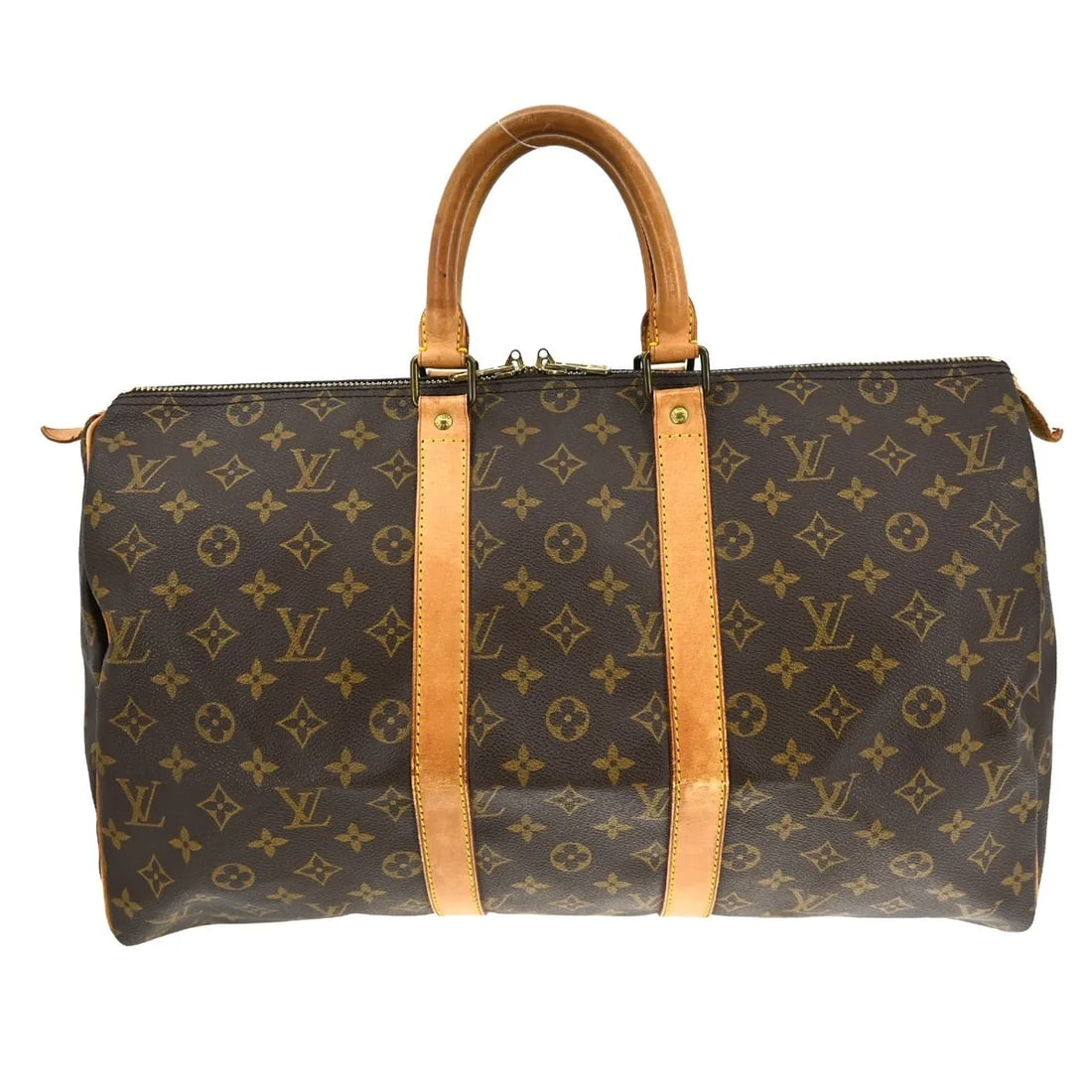 Louis Vuitton Keepall Travel Bag Monogram Canvas Brown: Louis Vuitton Keepall Travel Bag Monogram Canvas Brown Louis Vuitton Keepall in brown monogram canvas. This unisex bag is made in France and is presented in fair condition with visible wear. Noted con