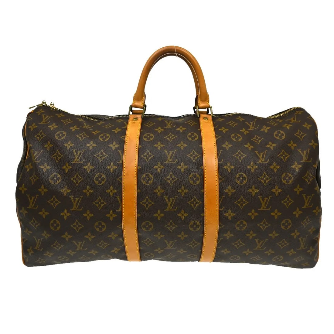 Louis Vuitton Keepall Travel Bag in Brown Monogram Canvas: Louis Vuitton Keepall Travel Bag in Brown Monogram Canvas Louis Vuitton Keepall in brown monogram canvas. This unisex travel bag is made in France and is presented in fair condition with visible wear.
