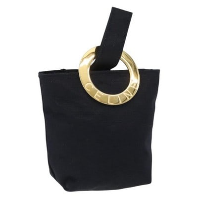 CELINE Round Canvas Pouch Black Gold Made in Japan: CELINE Round Canvas Pouch Black Gold Made in Japan Authentic CELINE circle pouch in black canvas with gold-tone accents. This compact pouch is made in Japan and shows moderate pre-owned wear consisten