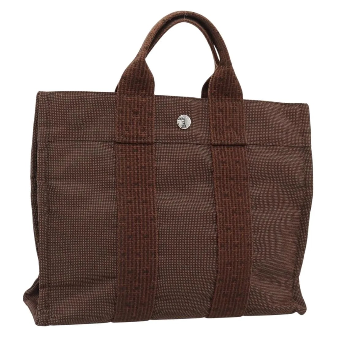 Hermes Fourre-tout Herline Brown Canvas Tote 30cm x 23cm x 7cm: Hermes Fourre-tout Herline Brown Canvas Tote 30cm x 23cm x 7cm This Hermes Fourre-tout Herline is a brown canvas tote designed for women. It features a spacious interior and sturdy handles, making it 