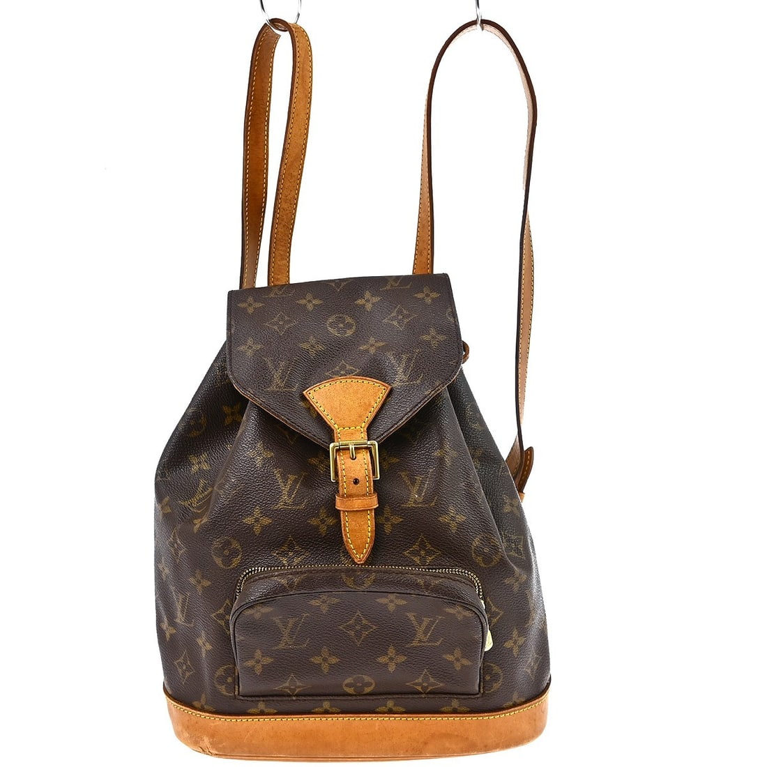 Louis Vuitton Montsouris MM Monogram Canvas Backpack M51136: Louis Vuitton Montsouris MM Monogram Canvas Backpack M51136 Vintage Louis Vuitton Montsouris MM backpack in brown Monogram canvas with leather trim. This medium backpack features a flap buckle and dra
