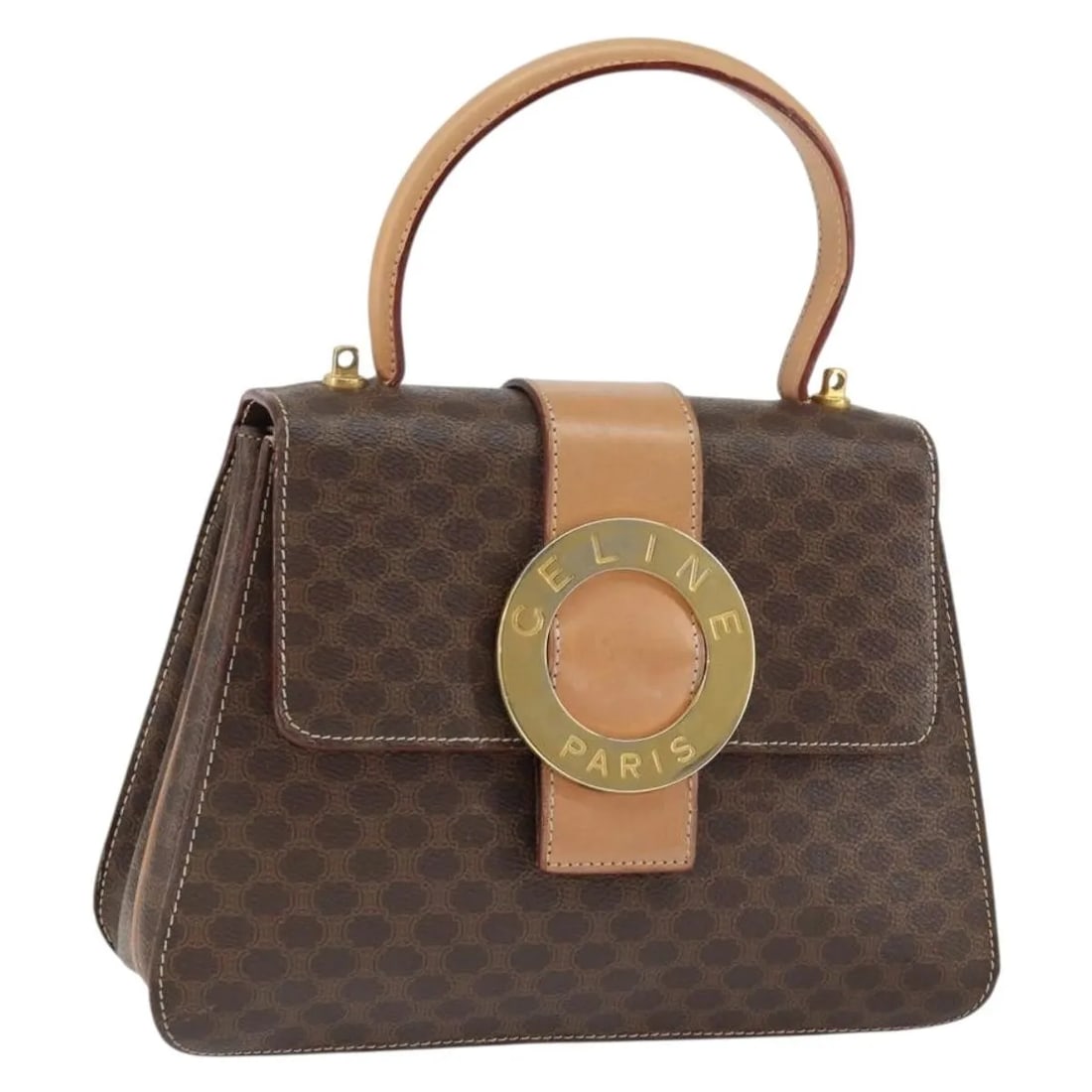 Celine Vintage Macadam Brown PVC Handbag Italy: Celine Vintage Macadam Brown PVC Handbag Italy This vintage Celine Macadam handbag is crafted from brown PVC with leather accents. It features metal fittings and a structured silhouette designed for w