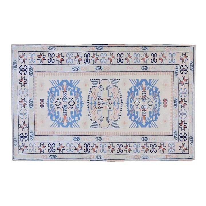 Hand-Knotted Wool Oushak Rug in Tan Turkish Design 4'2" x 6'6": Hand-Knotted Wool Oushak Rug in Tan Turkish Design 4'2" x 6'6" This vintage Turkish Oushak rug is hand-knotted from wool, showcasing traditional craftsmanship with a modern design sensibility. Its dur