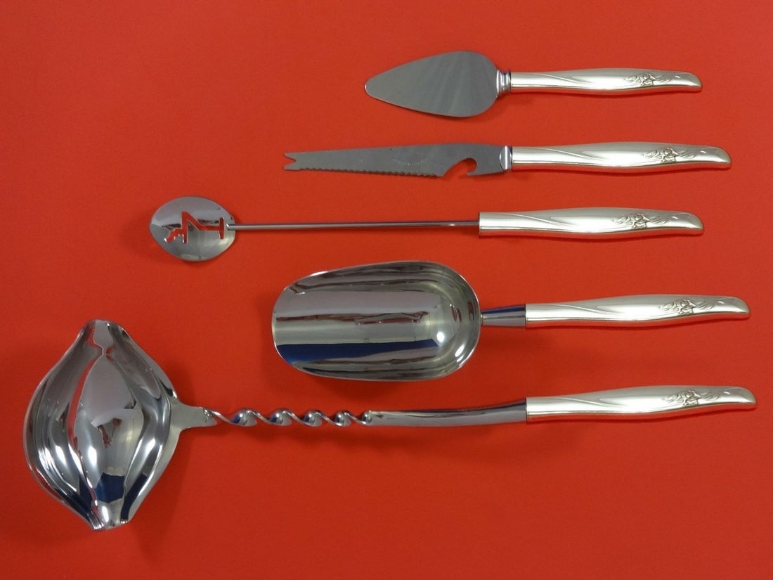 Gorham Sea Rose Sterling Silver 5pc Cocktail Bar Serving Set: Gorham Sea Rose Sterling Silver 5pc Cocktail Bar Serving Set Elevate your cocktail parties with the elegant Sea Rose by Gorham Sterling Silver Cocktail Party Bar Set. This exquisite 5-piece custom-mad