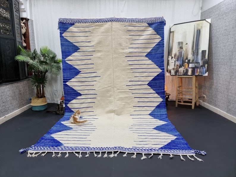 Authentic Handmade Moroccan Berber Wool Rug 8 x 5 Feet: Authentic Handmade Moroccan Berber Wool Rug 8 x 5 Feet Discover the beauty of this elegant, authentic handmade Moroccan Berber wool rug. Skillfully crafted by local Berber women weavers in the Middle 