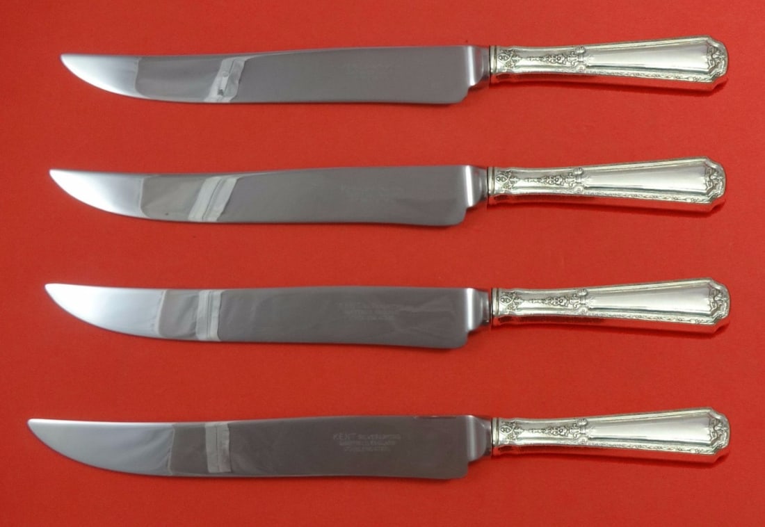 Louis XIV Towle Sterling Silver Steak Knife Set 4pc Texas Sized: Louis XIV Towle Sterling Silver Steak Knife Set 4pc Texas Sized Elevate your dining experience with the Louis XIV by Towle Sterling Silver Steak Knife Set. This custom-made 4-piece set features large,