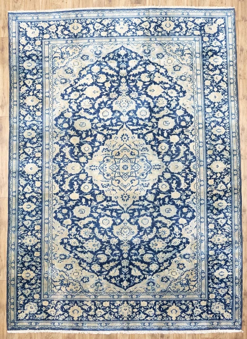 Hand Knotted Wool Vintage Floral Area Rug 8'6 x 11'10: Hand Knotted Wool Vintage Floral Area Rug 8'6 x 11'10 This semi-antique handmade Oriental rug features a traditional floral pattern in muted tones of navy blue, cream, and light blue. Hand-knotted fro