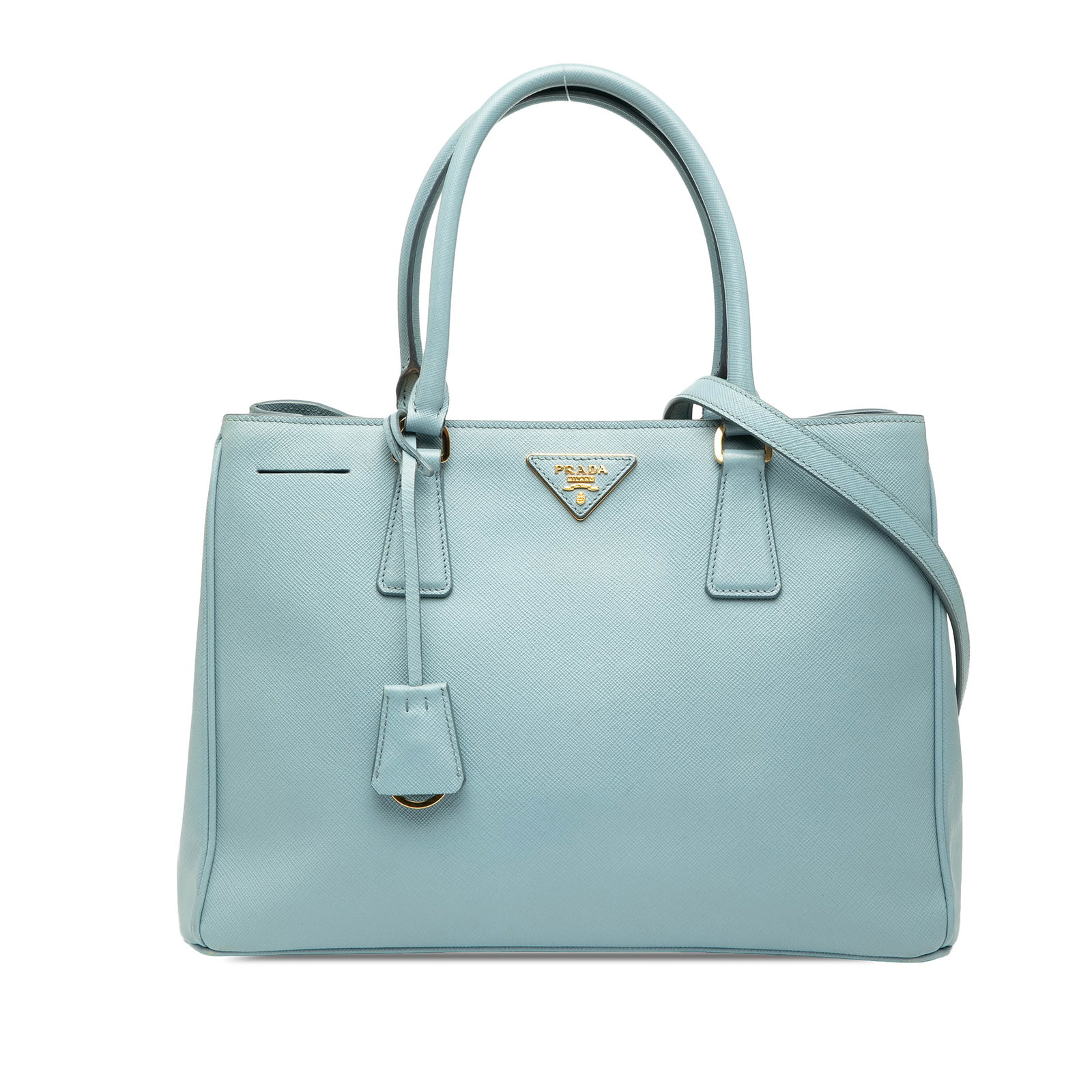 Prada Medium Saffiano Lux Galleria Satchel in Blue: Prada Medium Saffiano Lux Galleria Satchel in Blue The Prada Medium Saffiano Lux Galleria Satchel is a stylish and functional accessory crafted from high-quality saffiano leather. This elegant bag fea
