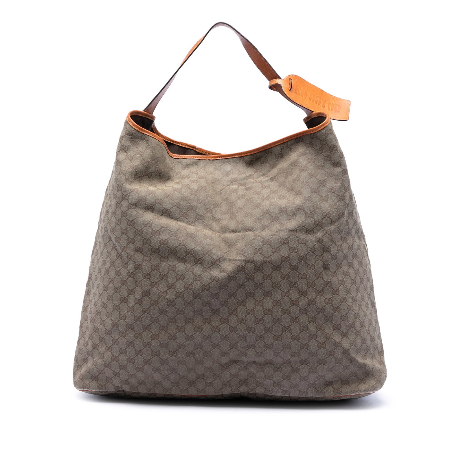 Beige Canvas Shoulder Tote with Leather Strap by Gucci GG: Beige Canvas Shoulder Tote with Leather Strap by Gucci GG This Gucci GG Canvas Tote features a beige fabric body with the iconic GG pattern, a flat leather strap, an open top with a magnetic snap clos