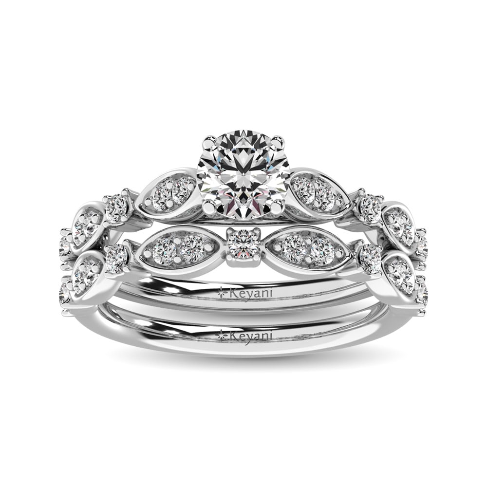 Diamond 3/4 Ct.Tw. Bridal Ring in 14K White Gold: Diamond 3/4 Ct.Tw. Bridal Ring in 14K White Gold 14k White Gold Stone Color: G-h Stone Clarity: Si2 Each ring is presented in standard size 6.5. Complimentary resizing is available between sizes 510 (