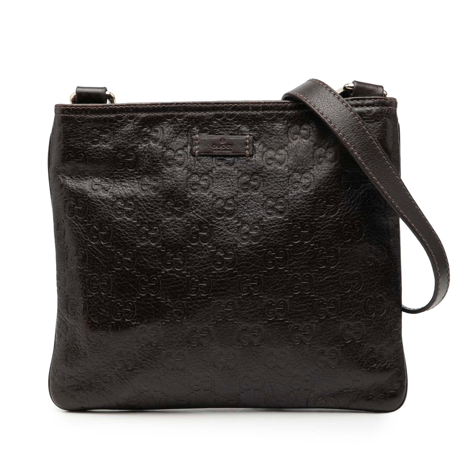 Gucci Guccissima Embossed Leather Brown Crossbody Bag Italy: Gucci Guccissima Embossed Leather Brown Crossbody Bag Italy This Guccissima crossbody bag is crafted from embossed brown leather and features an adjustable flat leather strap, a top zip closure, and i