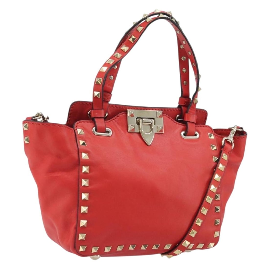 Valentino Red Leather Rockstud Two Way Handbag with Gold Hardware: Valentino Red Leather Rockstud Two Way Handbag with Gold Hardware This Valentino Rockstuds handbag features a red leather exterior accented with gold-tone details. Designed with both a top handle and 