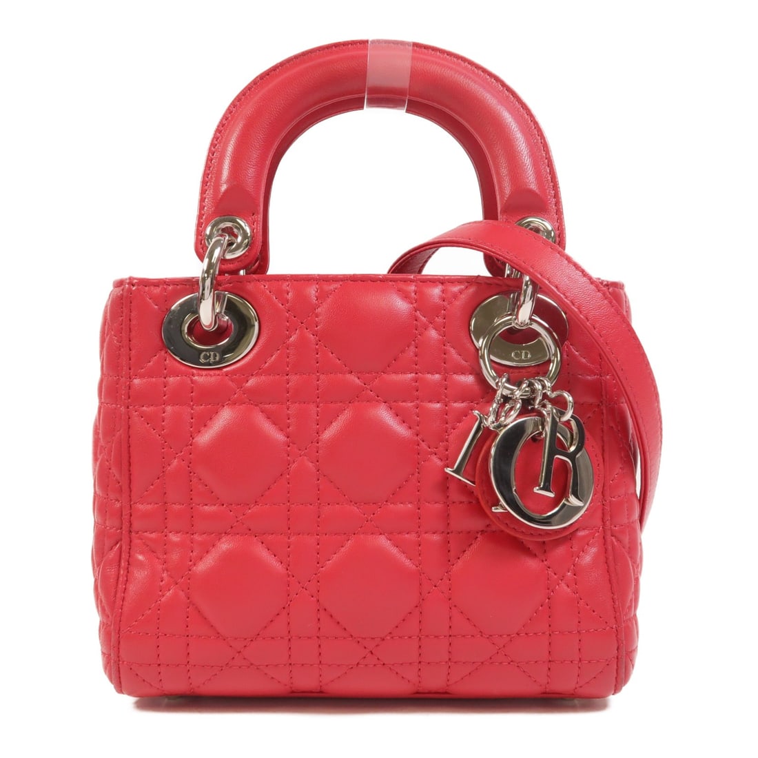 Dior Lady Dior Mini Pink Lambskin Leather Two Way Shoulder Handbag: Dior Lady Dior Mini Pink Lambskin Leather Two Way Shoulder Handbag This Christian Dior Lady Dior Mini 2-way shoulder bag features a pink lambskin leather exterior and is designed for versatile wear. I