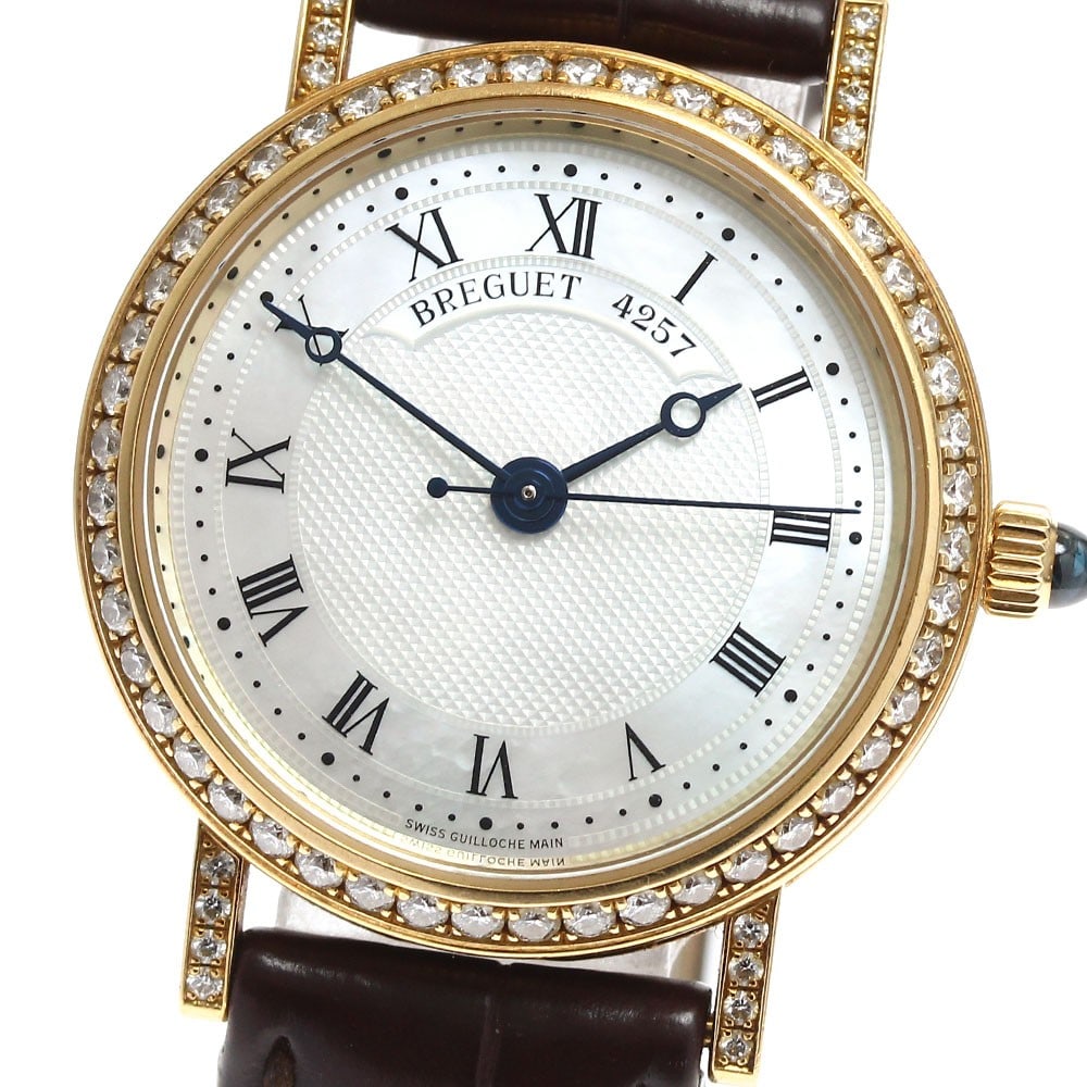 Breguet Classic 8068BA Ladies Automatic K18YG Wristwatch: Breguet Classic 8068BA Ladies Automatic K18YG Wristwatch This Breguet 8068BA Classic women's wristwatch features a K18 yellow gold case paired with a leather strap and a K18 yellow gold buckle. The wa