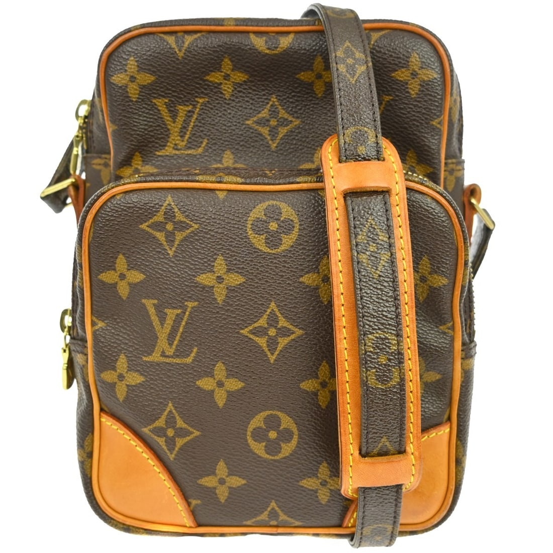 Louis Vuitton Amazone Monogram Canvas Crossbody Bag M45236: Louis Vuitton Amazone Monogram Canvas Crossbody Bag M45236 Vintage Louis Vuitton Amazone crossbody bag in brown Monogram canvas with leather trim and a zip closure. This medium unisex bag features an 