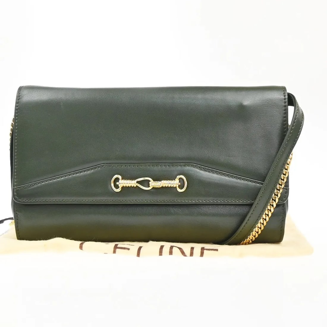 Celine Vintage Shoulder Bag Green Leather Italy: Celine Vintage Shoulder Bag Green Leather Italy This Celine vintage shoulder bag is crafted from green leather and designed for women. The bag features visible signs of wear, including scuffs, dirt, s
