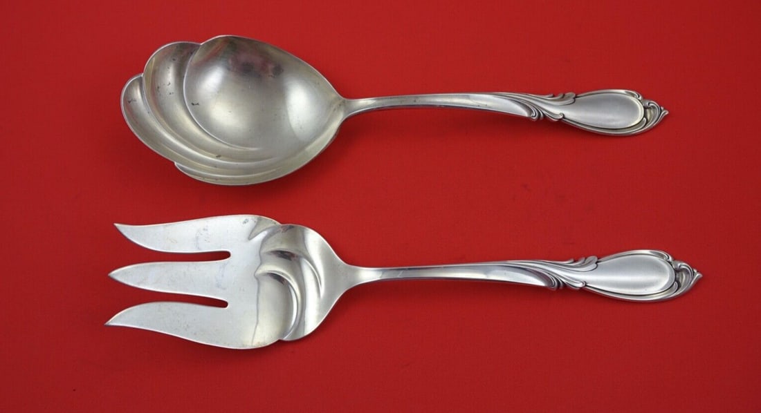 International Silver Rhapsody New 2-Piece Salad Serving Set 9-Inch: International Silver Rhapsody New 2-Piece Salad Serving Set 9-Inch Elevate your dining experience with this exquisite 2-piece salad serving set from the Rhapsody New pattern by International Silver. C