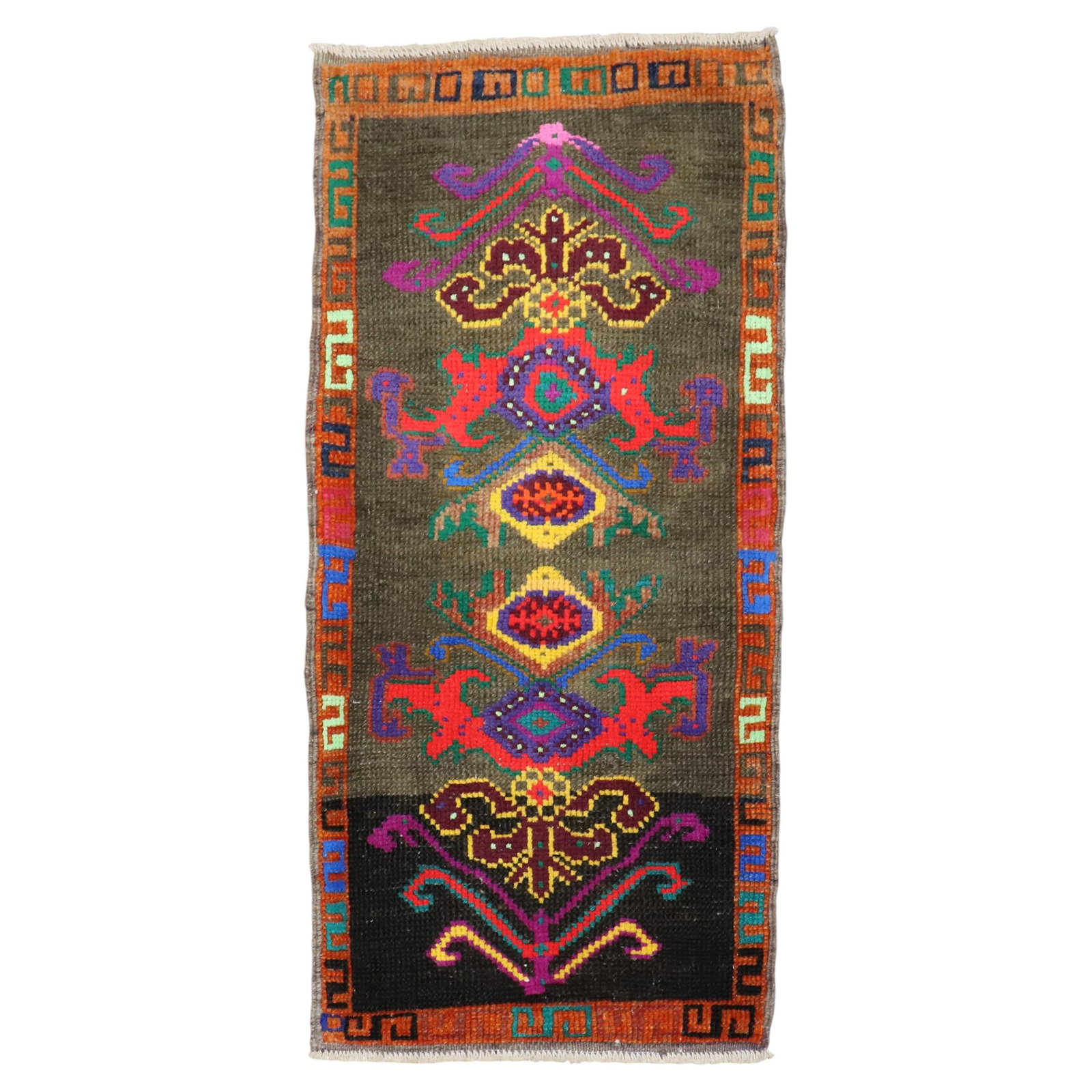 Hand Knotted Wool Turkish Futurist Mini Rug: Hand Knotted Wool Turkish Futurist Mini Rug This vintage Turkish Anatolian mini rug features a hand-knotted wool construction and showcases vibrant, colorful patterns in a quirky futurist style. Origi